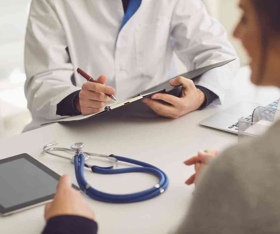 doctor writing diagnosis